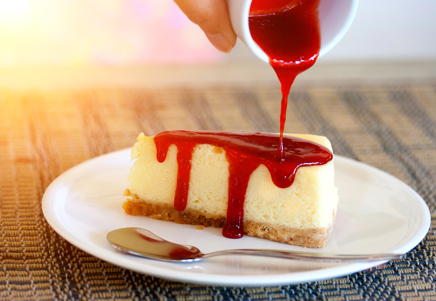 Pour Strawberry Sauce Into Cheesecake Orchards