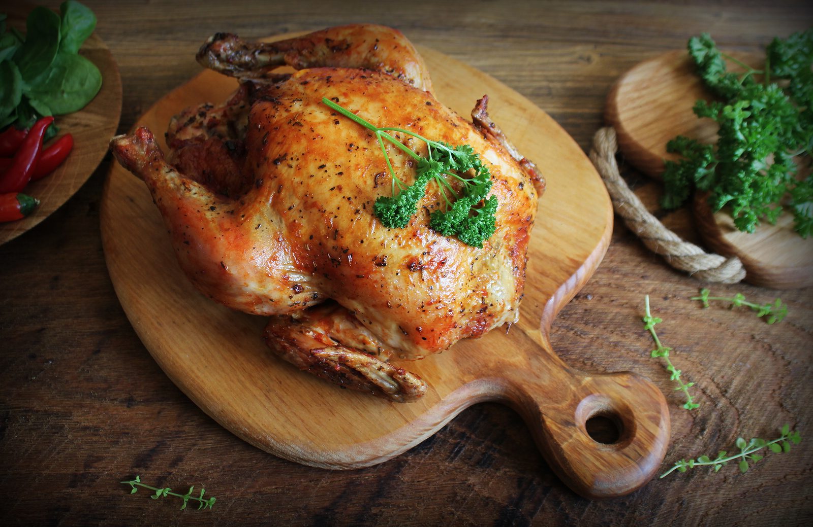 Whole Roasted Chicken With Herb On Cutting Board . Top View . | Bishop ...